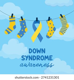 Yellow and blue socks hanging against sky and clouds for Down syndrome awareness, symbolizing inclusion, support and World Down Syndrome Day campaign