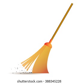 yellow broom sweeps debris on the wooden handle