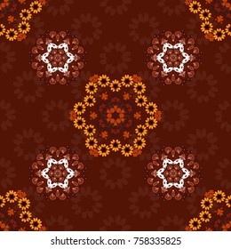 Yellow, brown and red abstract seamless pattern, Indian ornament. Vector floral mandala. Print for fabric or textile. Wrapping and scrapbook paper.