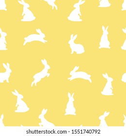 Yellow Bunny seamless pattern. Rabbits silhouettes. Vector