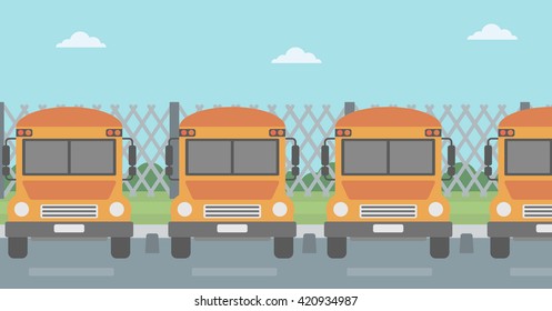 Yellow buses on the background of mesh fence.