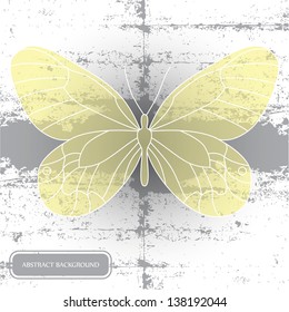 yellow butterfly on an old wall
