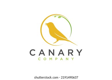 Yellow Canary bird logo design perched on a tree branch organic nature earth animal