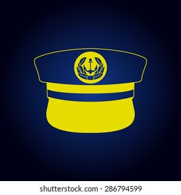 Yellow captain cap on a blue background