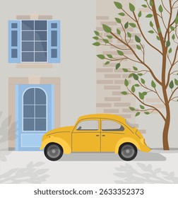 Yellow car against the background of an old house