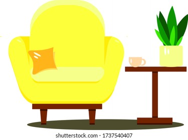 yellow chair and coffee table with a cup, green potted plant