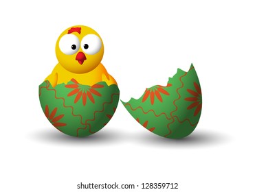 yellow chicken in a broken easter egg