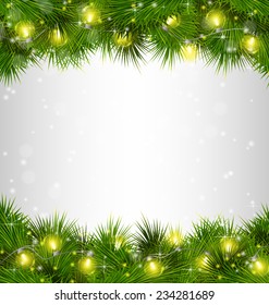 Yellow Christmas lights on pine branches on grayscale background