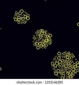 Yellow circles on a black background. Flying confetti. The contour of intersecting circles.