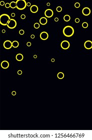 Yellow circles on a black background. Flying confetti. The contour of intersecting circles.