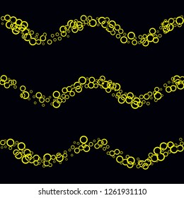 Yellow circles on a black background. Flying confetti. The contour of intersecting circles.
