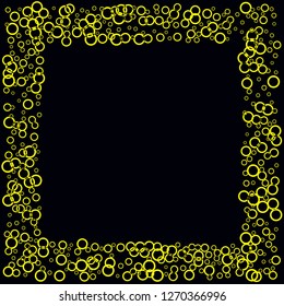 Yellow circles on a black background. Flying confetti. The contour of intersecting circles.