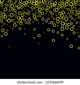 Yellow circles on a black background. Flying confetti. The contour of intersecting circles.