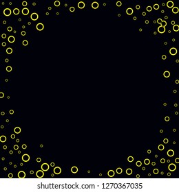 Yellow circles on a black background. Flying confetti. The contour of intersecting circles.