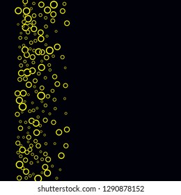 Yellow circles on a black background. Flying confetti. The contour of intersecting circles.