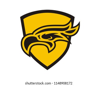 yellow color eagle head line art silhouette shape like tattoo logo design illustration for sport team need, like football, baseball, soccer, basketball, hockey with shield on background