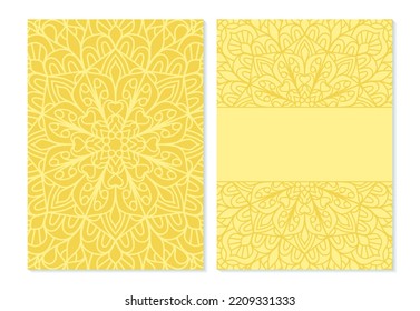 Yellow cover with mandala patterns and place for text.