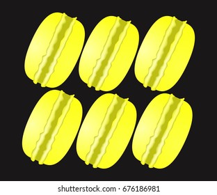 Yellow cute color one bright french macaron.Black background.