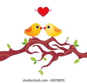 yellow cute little birds sitting together on a branch isolated - birds kiss