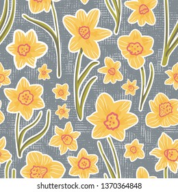 Yellow Daffodils on grey canvas - Stylized Folk Art. Seamless vector pattern. Great for home decor, apparel and stationery.