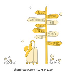 Yellow direction signpost with suitcase and hat. Travel concept.