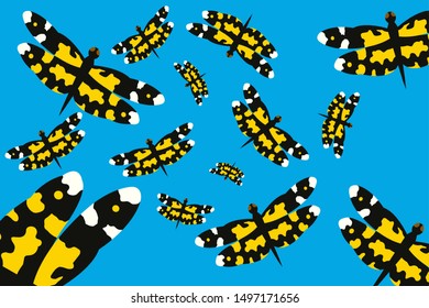 Yellow dragon flies flying in the sky