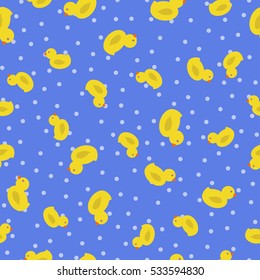 Yellow duck on a blue background Seamless vector pattern
