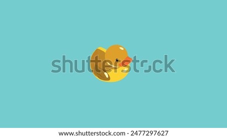 Yellow duckling on turquoise background, children toy duck, bath toy rubber duck, bathing duck