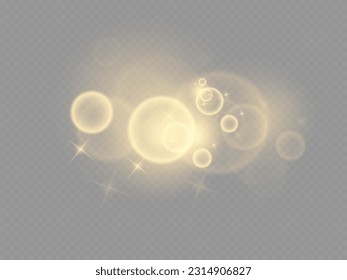Yellow dust. Beautiful light flashes. Dust particles fly in space. Bokeh effect.