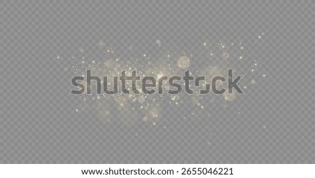 Yellow dust. Beautiful light flashes. Dust particles fly in space. Bokeh effect. Horizontal light rays. Glowing streaks of dust on a dark background