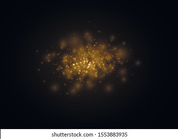 Yellow dust. Dust particles fly in space. Bokeh effect. horizontal light rays. Beautiful light flashes. Glowing streaks of dust on a dark background. Bright abstract sparkling lined background.