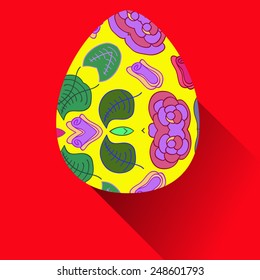 Yellow Easter egg with floral ornaments on a  red  background. Hand drawn. 