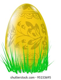 yellow easter egg in the grass