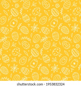 Yellow easter eggs, leaves and flowers. Seamless festive spring pattern. Happy and positive wrapping or background for your holiday goods