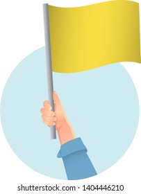 yellow flag in hand icon