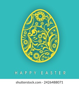 Yellow Floral Design Carving Egg Isolated on Pastel Blue Background for Happy Easter Concept.