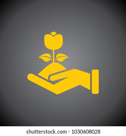 Yellow Flower Plant In Hand icon on black background.