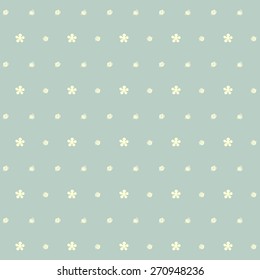 Yellow flowers and polka dot seamless pattern on light green background.