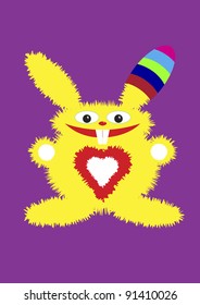 The yellow fluffy hare in a color cap smiles