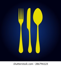 Yellow fork spoon knife on a blue background