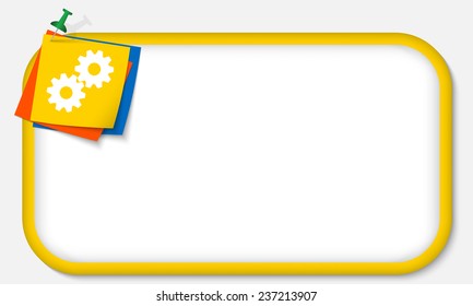 yellow frame with pushpin and cogwheels