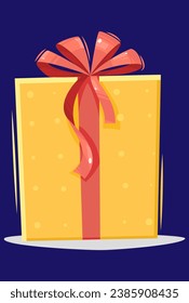 caja de regalo amarilla con cinta roja