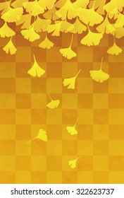 Yellow ginkgo leaves in orange gradient background