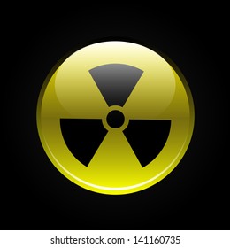 Yellow glossy radiation button on black