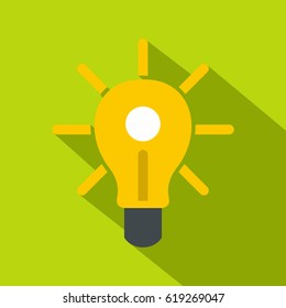 Yellow glowing light bulb icon. Flat illustration of yellow glowing light bulb vector icon for web