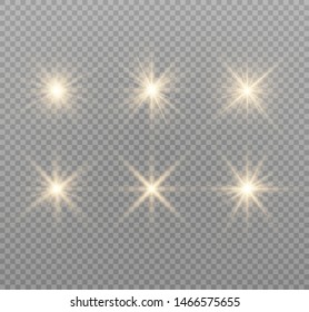 yellow glowing light explodes on a transparent background. Sparkling magical dust particles. Bright Star. Transparent shining sun, bright flash. Vector sparkles. To center a bright flash.