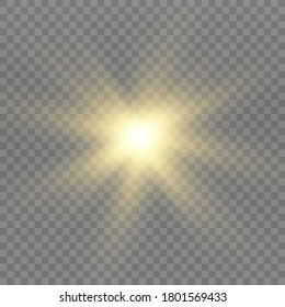 Yellow glowing light explodes on a transparent background. Sparkling magical dust particles. Bright Star. Transparent shining sun, bright flash. Vector sparkles. To center a bright flash.