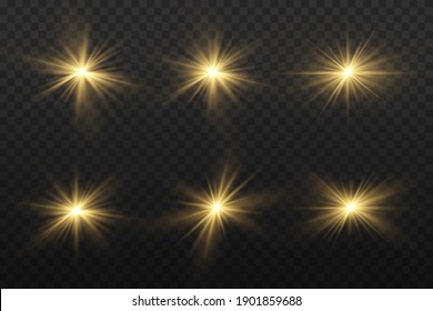 Yellow glowing light explodes on a transparent background. Sparkling magical dust particles. Bright Star. Transparent shining sun, bright flash. Vector sparkles. To center a bright flash.