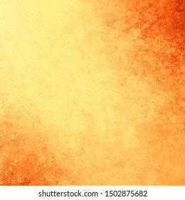 Yellow gold background vector with vintage texture grunge and orange fiery borders in warm autumn or tuscan colors