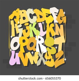 Yellow graffiti font on a gray background